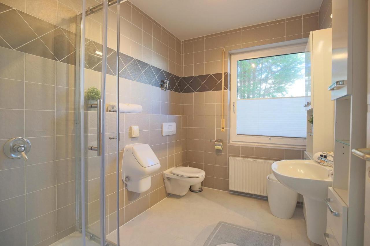 Ferienhaus Glockenstrasse Ferienwohnung Ostseehoehe Appartement 1 Scharbeutz Esterno foto