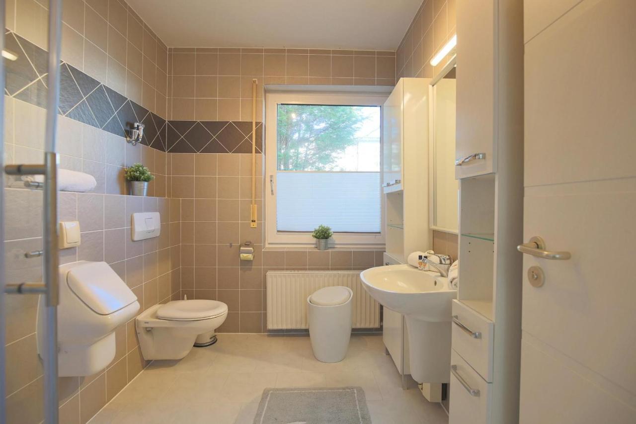 Ferienhaus Glockenstrasse Ferienwohnung Ostseehoehe Appartement 1 Scharbeutz Esterno foto